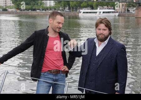 Actors Wanja Mues (left) and Antoine Monot, Jr. (right) pose on the gangway of the houseboat that is owned by Mues' character Leo in the TV show. 4 new episodes of the relaunch of the long running TV series 'Ein Fall fuer zwei’ (A case for two) are being filmed in Frankfurt for the German state TV broadcaster ZDF (Zweites Deutsches Fernsehen). It stars Antoine Monot, Jr. as defence attorney Benjamin ‘Benni’ Hornberg and Wanja Mues as private investigator Leo Oswald. The episodes are directed by Thomas Nennstiel. The episodes are set to air in October. (Photo by Michael Debets / Pacific Press) Stock Photo
