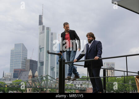 Actors Wanja Mues (left) an (Antoine Monot, Jr. (right) pose on the terrace of the upper floor of the houseboat that is owned by Mues' character Leo in the TV show, with the Frankfurt skyline in the background. 4 new episodes of the relaunch of the long running TV series 'Ein Fall fuer zwei’ (A case for two) are being filmed in Frankfurt for the German state TV broadcaster ZDF (Zweites Deutsches Fernsehen). It stars Antoine Monot, Jr. as defence attorney Benjamin ‘Benni’ Hornberg and Wanja Mues as private investigator Leo Oswald. The episodes are directed by Thomas Nennstiel. The episodes are  Stock Photo