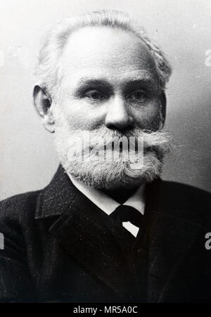 IVAN PAVLOV (1849-1936) Russian psychologist (at right with beard) with ...