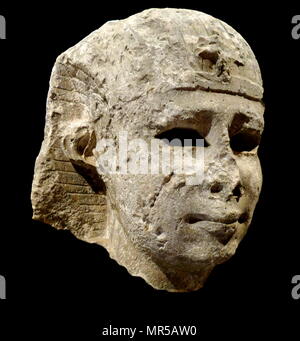 Colossal head from a Royal statue from Ancient Egypt. Built from Numulitic stone from Alexandria. Dated 300 BC Stock Photo