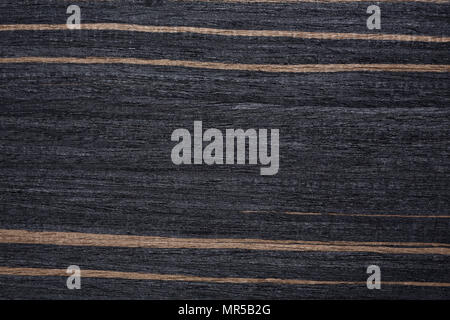 Extraordinary clear-cut veneer texture in dark tone. Stock Photo