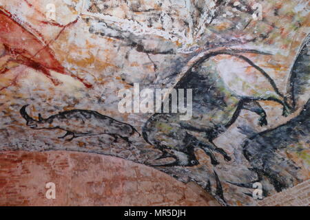 Replica painting from the Cave of Altamira (Cueva de Altamir) located near the historic town Santillana del Mar in Cantabria, Spain, is renowned for its numerous parietal cave paintings featuring charcoal drawings and polychrome paintings of contemporary local fauna and human hands, created between 18,500 and 14,000 years ago during the Upper Palaeolithic by Paleo human settlers. The earliest paintings in the cave were executed around 35,600 years ago. Stock Photo