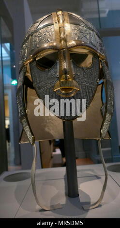 reconstruction of the Sutton Hoo helmet, a decorated Anglo-Saxon helmet discovered during the 1939 excavation of the Sutton Hoo ship-burial. Buried around 625 AD. it is believed to have been the helmet of King Raedwald; for whom its elaborate decoration may have given it a secondary function almost akin to a crown. Stock Photo