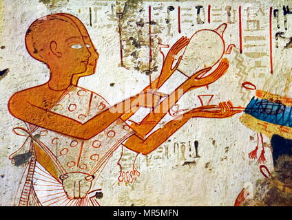 Priest dressed in leopard skin, perform purification rites. Wall painting from the Theban Tomb of Userhat, the Royal Scribe. It forms part of the Theban Necropolis, situated on the west bank of the Nile opposite Luxor.  The tomb is the burial place of Userhat an Ancient Egyptian official, during the 18th dynasty king Amenhotep II Stock Photo