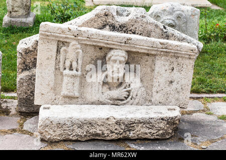 KONYA, TURKEY - MAY 7, 2018: detail of ancient sarcophagus on outdoor yard of Konya Archaeological Museum. The Gallery is a state museum, it was estab Stock Photo