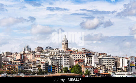 ISTANBUL, TURKEY - MAY 11, 2018: Galata (Karakoy) District over Golden Horn bay. Karakoy is a commercial quarter in the Beyoglu district located on th Stock Photo