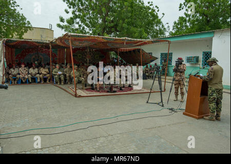 Chadians and Americans participate in the Closing Ceremony of Medical Readiness Training Exercise held at the Military Teaching Hospital in N'Djamena, Chad, May 18. MEDRETE 17-3 is the third in a series of medical readiness training exercises that USARAF is scheduled to facilitate in various countries in Africa. The mutually beneficial exercise offers opportunities for the partnered militaries to share best practices and improve medical treatment processes. (U.S. Army Africa photo by Staff Sgt. Shejal Pulivarti) Stock Photo