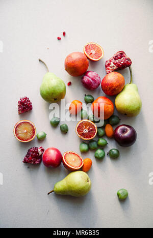 Varitety of fresh summer fruits on neutral background Stock Photo