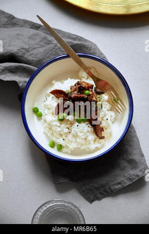 Comfort food bowl with jasmin rice, shiitake mushrooms and green peas Stock Photo