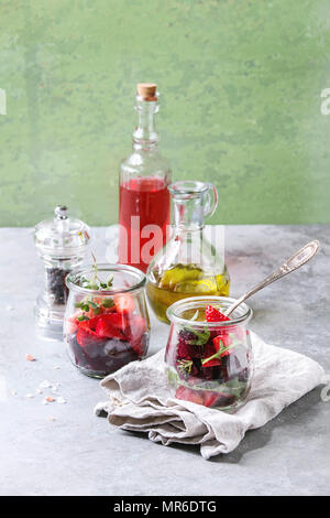 Beetroot salad with oil and nuts in white bowl. Selective focus Stock Photo - Alamy