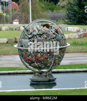 Armillary Sphere in the grounds of the Palais des Nations, United Nations Headquarters, Geneva, Switzerland. It depicts allegorical representations of 85 constellations. The Woodrow Wilson Foundation gave the Sphere to the League of Nations in 1939 as a memorial to the US President. This was the home of the League of Nations, and is the present meeting place of the Conference on Disarmament. Stock Photo