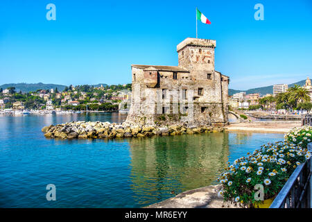 italian castles on sea italian flag - Rapallo Genoa Tigullio gulf near Portofino Italy Stock Photo