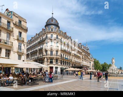 Cafes and restaurants on Place de la Comédie in the old town centre, Montpellier, Languedoc, France Stock Photo