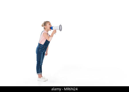 Full length view of adorable little girl screaming in megaphone isolated on white Stock Photo