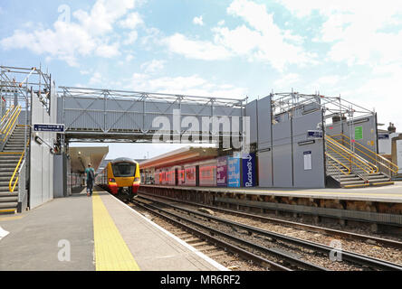 A temporary footbridge provides access between platforms at Twickenham railway station in West London, UK