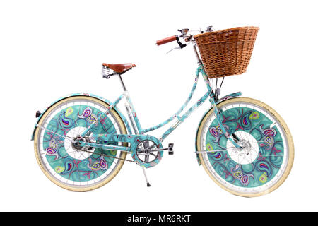 Ladies paisley decorated bicycle isolated on a white studio background. Stock Photo