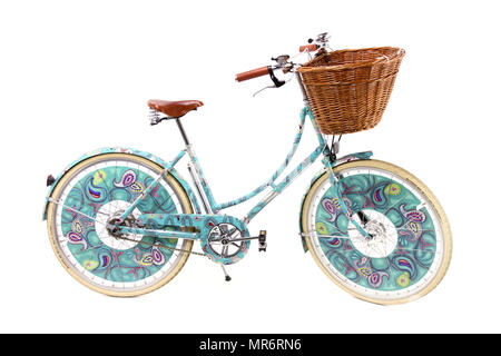 Ladies paisley decorated bicycle isolated on a white studio background. Stock Photo
