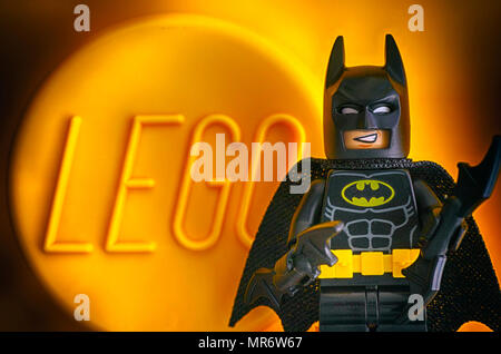 Tambov, Russian Federation - May 20, 2018 Lego Batman minifigure against yellow background with word LEGO. Studio shot. Stock Photo