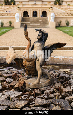 A zinc fountain of a boy and swan in the grounds of Osborne House, Isle of wight.