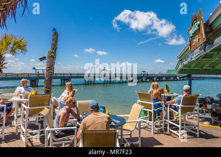 People enjoying summer day at Beaches at Vilano waterfront outdoor restaurant cafe in Vilano Beach near St Augustine Florida Stock Photo