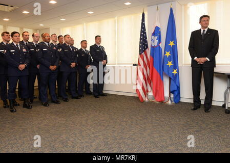 Members of the 102nd and 103rd Rescue Squadrons of the 106th Rescue Wing assigned to the New York Air National Guard, are awarded the Slovenian Medal for Merit in the military field by the President Borut Pahor of Slovenia May 21, 2017. The ceremony took place at the Permanent Mission of the Republic of Slovenia office to the United Nations, NY, NY for their international rescue mission to render aid to crew members injured in an explosion on board the motor vessel Tamar that began on April 24th. (U.S. Air National Guard Photo by Captain Michael O’Hagan) Stock Photo