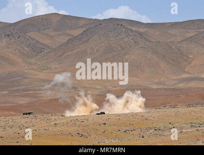 An Afghan Air Force A-29 Super Tucano drops training munitions on a target during live-fire training exercise held by Train, Advise, Assist Command-Air (TAAC-Air) advisors, for a class of Afghan Tactical Air Coordinators near Logar Province, Afghanistan, May 21, 2017. Prior to the exercise, advisors from TAAC-Air conducted three weeks of classroom training where students learn radio communication, map and compass reading GPS coordinate plotting and friendly centric air support as part of air-to-ground integration. The live fire exercise is part of a practical evaluation before Afghan Air Force