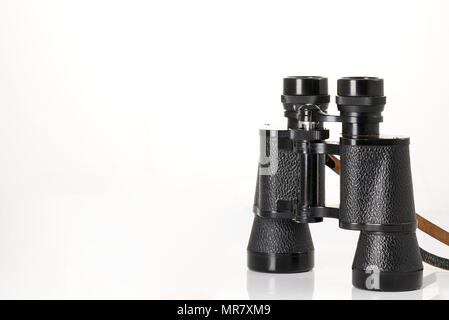 Retro binoculars (field glasses) isolated on a white background. Stock Photo