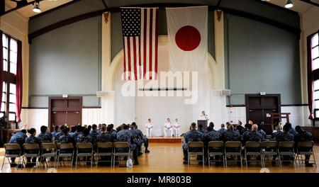 YOKOSUKA, Japan (May 25, 2017) – Capt. Jeffrey Kim, Commander, Fleet Activities, Yokosuka (CFAY), speaks at the Memorial Day Ceremony held on the base. The ceremony commemorated the lives of those lost during service in the armed forces. CFAY provides, maintains, and operates base facilities and services in support of 7th Fleet’s forward-deployed naval forces, 83 tenant commands, and 24,000 military and civilian personnel. (Photo by Kristina Mullis/170525-N-LV456-024 Released by FLEACT Yokosuka Public Affairs Office) Stock Photo