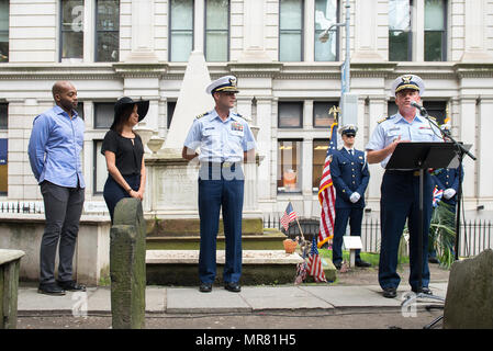 As a part of Fleet Week New York, crew members from the Coast Guard Cutter Hamilton and guests honored Coast Guard founder, Alexander Hamilton, with a memorial wreath-laying ceremony at his grave at Trinity Church in New York City, May 26, 2017. Cast members Brandon Victor Dixon (Aaron Burr) and Lexi Lawson (Eliza Hamilton) of the esteemed Broadway musical, Hamilton also attended and paid their respect for the shared namesake of both the vessel and the play. U.S. Coast Guard photo by Petty Officer 1st Class LaNola Stone. Stock Photo