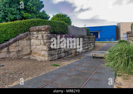 The wall was moved brick by brisk from an old railway cutting.  It is now preserved for heritage Stock Photo