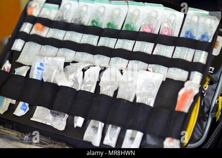 Paramedic's drug administration pack of catheters, needles and syringes. Stock Photo