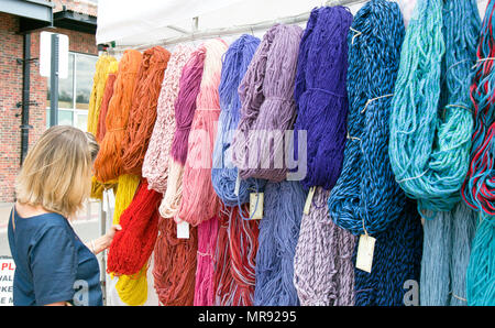 Yarn Booth at The Railyard, Santa Fe, New Mexico. Farmers markets twice a week bring out assorted artisansm crafts, tourists, and entertainments. Stock Photo