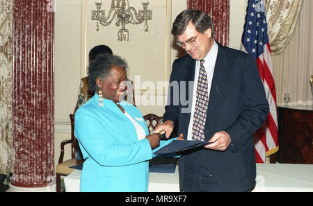 woman accepting award taking a picture Stock Photo