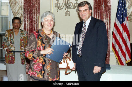 woman accepting award taking a picture Stock Photo