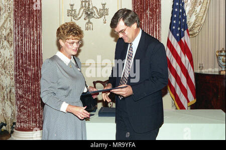 woman accepting award taking a picture Stock Photo