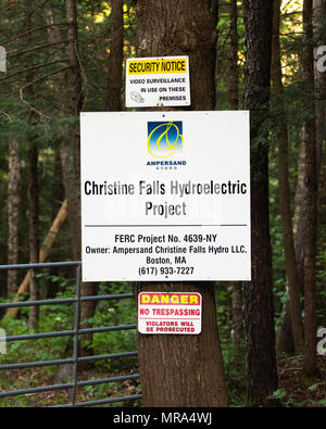 Sign at the entrance to the Christine Falls Hydroelectric Project on the Sacandaga River in the Adirondack Mountains, NY USA Stock Photo