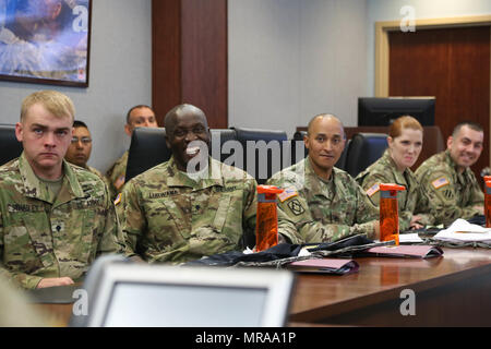 U.S. Army Soldiers participate in the competitors' briefing for the Network Enterprise Technology Command (NETCOM) Best Warrior Competition at Fort Huachuca, Az., May 11, 2017. The welcome brief was organized to introduce the NETCOM command team to Soldiers participating in this year's competition. (U.S. Army photo by Spc. Quince C. Lanford) Stock Photo