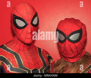 ExCel, London, 26th May 2018. Two cosplayers as Spiderman and Spidergirl. Cosplayers, Comic Characters, superheros and costumed visitors come together for MCM Comicon 2018 on the second day, a busy Saturday, running at ExCel Exhibition Centre May 25-27th. Credit: Imageplotter News and Sports/Alamy Live News Stock Photo