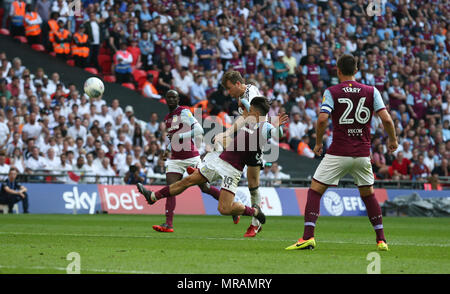 Kevin McDonald of Fulham gets a shot away under pressure from Jack Grealish of Aston Villa during the Sky Bet Championship Play-Off Final match between Aston Villa and Fulham at Wembley Stadium on May 26th 2018 in London, England. (Photo by Arron Gent/phcimages.com)