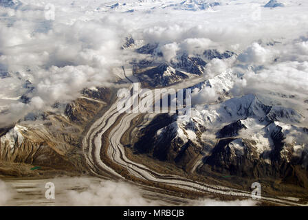 The Chugach mountains in Alaska with summer snow and clouds Stock Photo