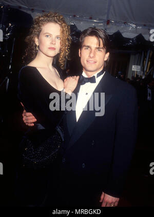 LOS ANGELES, CA - MARCH 25: (L-R) Actress Nicole Kidman and actor Tom Cruise attend the 63rd Annual Academy Awards on March 25, 1991 at Shrine Auditorium in Los Angeles, California. Photo by Barry King/Alamy Stock Photo Stock Photo