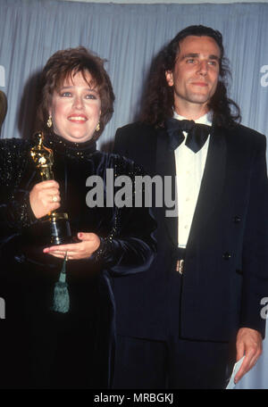 LOS ANGELES, CA - MARCH 25: (L-R) Actress Kathy Bates and actor Daniel Day Lewis attend the 63rd Annual Academy Awards on March 25, 1991 at Shrine Auditorium in Los Angeles, California. Photo by Barry King/Alamy Stock Photo Stock Photo