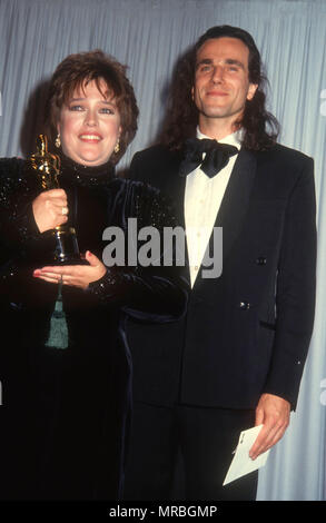 LOS ANGELES, CA - MARCH 25: (L-R) Actress Kathy Bates and actor Daniel Day Lewis attend the 63rd Annual Academy Awards on March 25, 1991 at Shrine Auditorium in Los Angeles, California. Photo by Barry King/Alamy Stock Photo Stock Photo