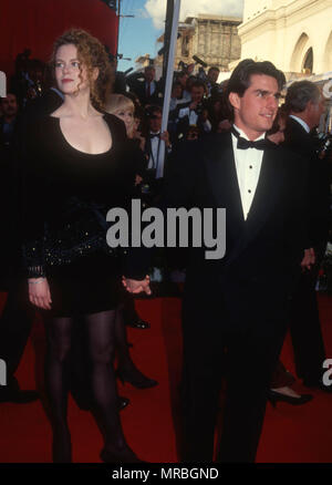 LOS ANGELES, CA - MARCH 25: (L-R) Actress Nicole Kidman and actor Tom Cruise attend the 63rd Annual Academy Awards on March 25, 1991 at Shrine Auditorium in Los Angeles, California. Photo by Barry King/Alamy Stock Photo Stock Photo