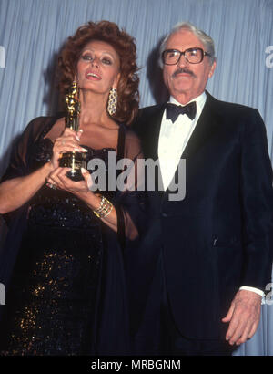 Sophia Loren and Gregory Peck at the 63rd Academy Awards ceremony on ...