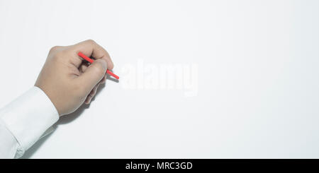Businessman's hand writing something on a white wall Stock Photo