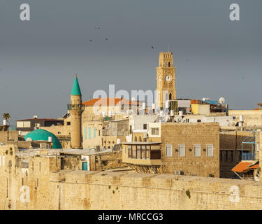 ACRE, ISRAEL - MARCH 23, 2018: View of the old city of Acre, with the clock tower, minarets and mosque Stock Photo