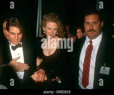 LOS ANGELES, CA - MARCH 25: (L-R) Actor Tom Cruise and actress Nicole Kidman attend the 63rd Annual Academy Awards on March 25, 1991 at Shrine Auditorium in Los Angeles, California. Photo by Barry King/Alamy Stock Photo Stock Photo