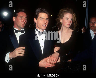 LOS ANGELES, CA - MARCH 25: (L-R) Actor Tom Cruise and actress Nicole Kidman attend the 63rd Annual Academy Awards on March 25, 1991 at Shrine Auditorium in Los Angeles, California. Photo by Barry King/Alamy Stock Photo Stock Photo