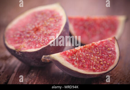 Fresh organic common fig on natural surface Stock Photo